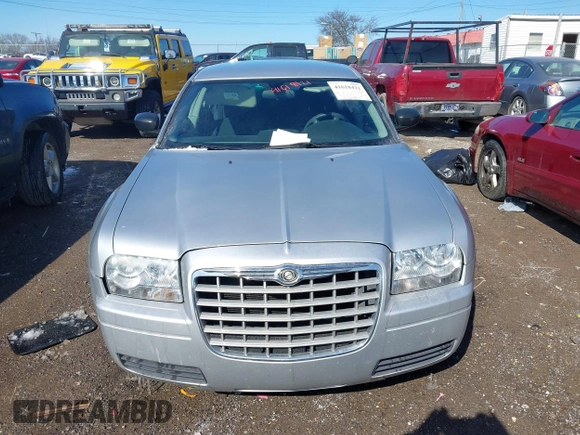 2005 Chrysler 300 with VIN 2C3JA43RX5H569173, listed as a IAAI auction lot 41618421 with 126,019 mi miles. Bid and sale history available at carsss.com. Image 6.