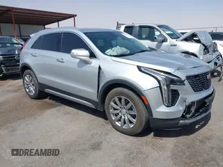 2021 Cadillac XT4 FWD Premium Luxury with VIN 1GYFZCR42MF005253, listed as a IAAI auction lot 40470700 with 70,571 mi miles and . Bid and sale history available at carsss.com. Image 13.
