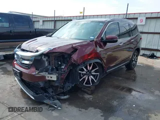 2019 Honda Pilot Touring 8-Passenger z VIN 5FNYF5H95KB009122, wystawiony jako IAAI lot #41573338 z przebiegiem 85 845 mil mil oraz . Historia ofert i sprzedaży dostępna na DreamBid. Obrazek 2.