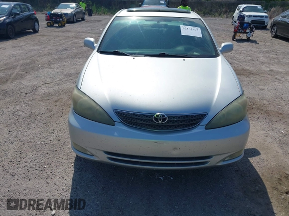 2003 Toyota Camry LE with VIN 4T1BE32K63U752904, listed as a IAAI auction lot 42142677 with 112,895 mi miles and . Bid and sale history available at DreamBid. Image 6.