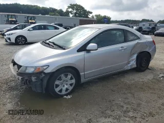 2009 Honda Civic Cpe LX with VIN 2HGFG12629H521583, listed as a Copart auction lot 66502414 with 136,478 mi miles and Salvage Title. Bid and sale history available at carsss.com. Image 1.