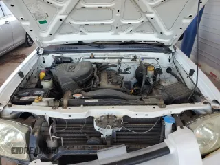 2002 Nissan Frontier XE with VIN 1N6DD26SX2C311752, listed as a Copart auction lot 61182715 with 95,746 mi miles and Salvage title. Bid and sale history available at DreamBid. Image 11.