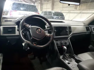2018 Volkswagen Atlas SE with VIN 1V2CP2CA9JC599827, listed as a Copart auction lot 55695875 with 64,268 mi miles and Salvage title. Bid and sale history available at DreamBid. Image 8.