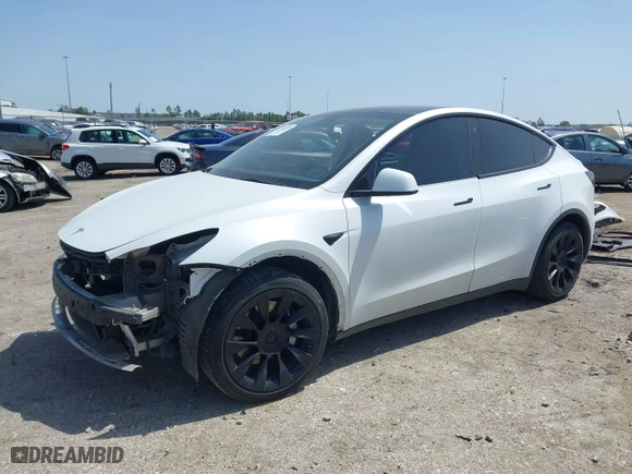 2021 Tesla Model Y Long Range with VIN 5YJYGAEE8MF187987, listed as a IAAI auction lot 41795626 with 56,007 mi miles. Bid and sale history available at carsss.com. Image 20.