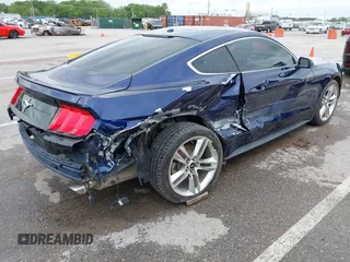 2020 Ford Mustang EcoBoost with VIN 1FA6P8TH2L5108722, listed as a IAAI auction lot 42182257 with 65,651 mi miles and . Bid and sale history available at DreamBid. Image 4.
