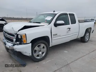 2010 Chevrolet Silverado 1500 LT with VIN 1GCSCSE00AZ293058, listed as a IAAI auction lot 41464133 with 164,865 mi miles and . Bid and sale history available at DreamBid. Image 2.