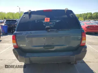2004 Jeep Grand Cherokee Laredo with VIN 1J4GX48S74C195326, listed as a Copart auction lot 53993785 with 280,456 mi miles and Salvage title. Bid and sale history available at DreamBid. Image 6.