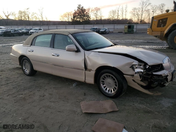 2002 Lincoln Town Car Cartier with VIN 1LNHM83W62Y618719, listed as a Copart auction lot 88722925 with 0 mi miles and Salvage Title. Bid and sale history available at carsss.com. Image 4.