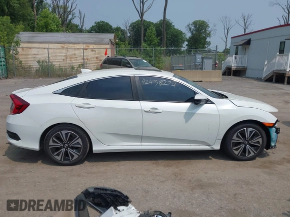 2016 Honda Civic EX-L z VIN 2HGFC1F79GH637326, wystawiony jako IAAI lot #42438274 z przebiegiem 215 846 mil mil oraz . Historia ofert i sprzedaży dostępna na DreamBid. Obrazek 14.