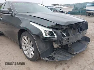 2015 Cadillac CTS AWD z VIN 1G6AW5SX6F0116891, wystawiony jako IAAI lot #42077259 z przebiegiem 119 426 mil mil oraz . Historia ofert i sprzedaży dostępna na DreamBid. Obrazek 6.