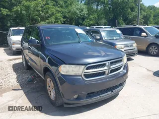 2013 Dodge Durango SXT z VIN 1C4RDHAG4DC679636, wystawiony jako IAAI lot #42346309 z przebiegiem 289 203 mil mil oraz . Historia ofert i sprzedaży dostępna na DreamBid. Obrazek 1.
