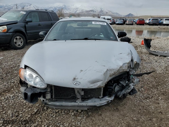 1999 Hyundai Tiburon with VIN KMHJG24F8XU126762, listed as a Copart auction lot 88747725 with 51,296 mi miles and Salvage Title. Bid and sale history available at carsss.com. Image 5.