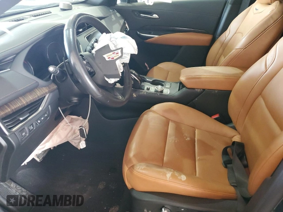 2023 Cadillac XT4 AWD Sport z VIN 1GYFZFR41PF103650, wystawiony jako Copart lot #59321355 z przebiegiem 27 092 mil mil oraz Szkoda całkowita • Salvage title. Historia ofert i sprzedaży dostępna na DreamBid. Obrazek 7.