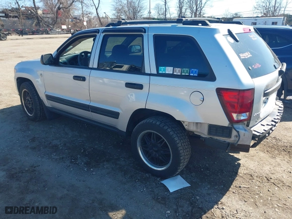 2005 Jeep Grand Cherokee Laredo with VIN 1J4HR48N65C595873, listed as a IAAI auction lot 41715998 with 145,689 mi miles. Bid and sale history available at carsss.com. Image 3.