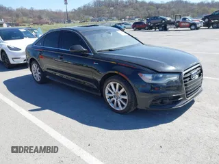 2012 Audi A6 3.0T Prestige with VIN WAUHGBFC7CN102802, listed as a IAAI auction lot 41857968 with 140,466 mi miles. Bid and sale history available at carsss.com. Image 1.