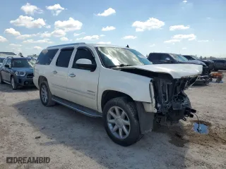 2009 GMC Yukon XL Denali with VIN 1GKFK062X9R296347, listed as a Copart auction lot 73412054 with 166,867 mi miles and Salvage Title. Bid and sale history available at carsss.com. Image 4.