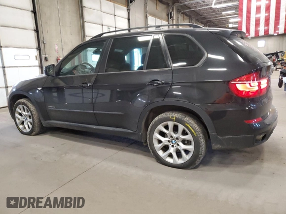 2011 BMW X5 35i z VIN 5UXZV4C52BL743475, wystawiony jako Copart lot #56238615 z przebiegiem 218 738 mil mil oraz Szkoda całkowita • Salvage title. Historia ofert i sprzedaży dostępna na DreamBid. Obrazek 2.