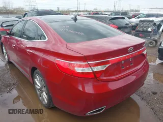 2014 Hyundai Azera Limited with VIN KMHFH4JG9EA419547, listed as a IAAI auction lot 41906777 with 134,100 mi miles and . Bid and sale history available at DreamBid. Image 3.
