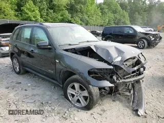 2012 BMW X5 35i with VIN 5UXZV4C5XCL761370, listed as a Copart auction lot 59436845 with 124,722 mi miles and Salvage title. Bid and sale history available at DreamBid. Image 14.