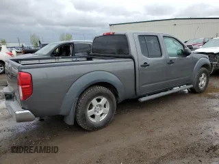 2008 Nissan Frontier LE with VIN 1N6AD09W58C411210, listed as a Copart auction lot 56664755 with 286,386 mi miles and Salvage title. Bid and sale history available at DreamBid. Image 3.