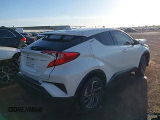 2021 Toyota C-HR LE with VIN JTNKHMBX3M1114590, listed as a IAAI auction lot 41560459 with 61,803 mi miles. Bid and sale history available at carsss.com. Image 4.