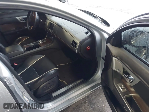 2014 Jaguar XF V6 SC with VIN SAJWJ0EF9E8U17227, listed as a IAAI auction lot 40455665 with 125,196 mi miles. Bid and sale history available at carsss.com. Image 5.