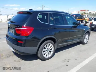 2011 BMW X3 28i with VIN 5UXWX5C57BL715884, listed as a IAAI auction lot 41969911 with 101,067 mi miles. Bid and sale history available at carsss.com. Image 4.