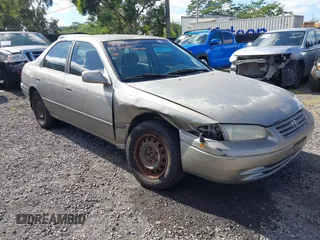 1998 Toyota Camry LE z VIN JT2BF22K1W0093243, wystawiony jako IAAI lot #41383742 z przebiegiem 147 769 mil mil oraz . Historia ofert i sprzedaży dostępna na DreamBid. Obrazek 1.