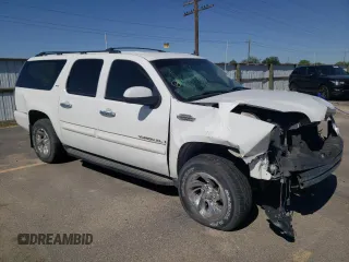 2007 GMC Yukon XL SLT z VIN 1GKFK16327J355384, wystawiony jako Copart lot #52161335 z przebiegiem 127 368 mil mil oraz Szkoda całkowita • Salvage title. Historia ofert i sprzedaży dostępna na DreamBid. Obrazek 4.