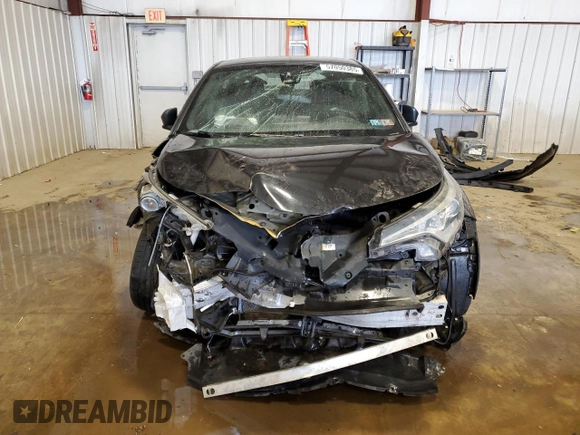 2018 Toyota C-HR XLE z VIN NMTKHMBX0JR041387, wystawiony jako Copart lot #57050385 z przebiegiem Nie podano mil oraz Szkody całkowita. Historia ofert i sprzedaży dostępna na DreamBid. Obrazek 5.