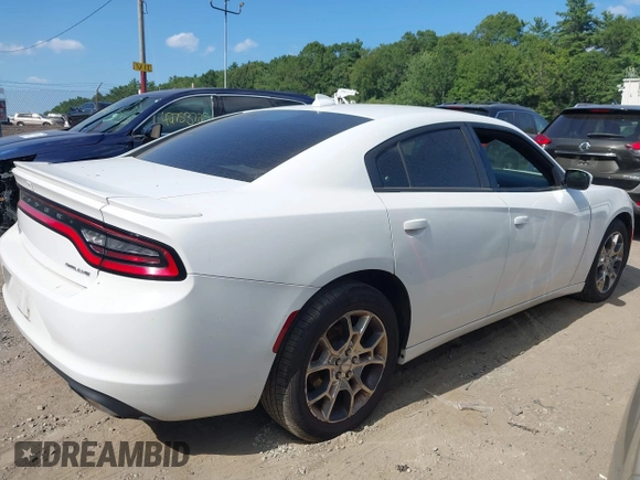 2015 Dodge Charger SXT with VIN 2C3CDXJG3FH742777, listed as a IAAI auction lot 42763427 with 151,409 mi miles and . Bid and sale history available at DreamBid. Image 4.