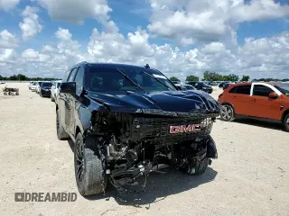 2023 GMC Yukon XL Denali with VIN 1GKS2JKT2PR438920, listed as a Copart auction lot 69749244 with 23,817 mi miles and Salvage Title. Bid and sale history available at DreamBid. Image 12.