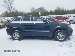 2013 Jeep Grand Cherokee Laredo with VIN 1C4RJFAGXDC542987, listed as a IAAI auction lot 41262770 with 199,273 mi miles. Bid and sale history available at carsss.com. Image 12.