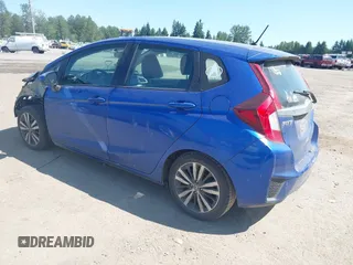 2015 Honda Fit EX-L z VIN 3HGGK5H85FM745849, wystawiony jako IAAI lot #42443790 z przebiegiem 93 488 mil mil oraz . Historia ofert i sprzedaży dostępna na DreamBid. Obrazek 3.