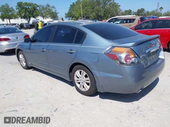 2011 Nissan Altima 2.5 S with VIN 1N4AL2AP6BN421591, listed as a IAAI auction lot 42122870 with 148,897 mi miles. Bid and sale history available at carsss.com. Image 3.