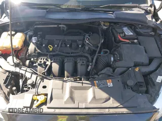 2015 Ford Focus SE with VIN 1FADP3F23FL313614, listed as a IAAI auction lot 42153320 with 121,346 mi miles. Bid and sale history available at carsss.com. Image 10.