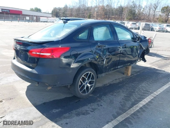 2016 Ford Focus SE with VIN 1FADP3F23GL304834, listed as a IAAI auction lot 41455806 with 1 mi miles. Bid and sale history available at carsss.com. Image 4.