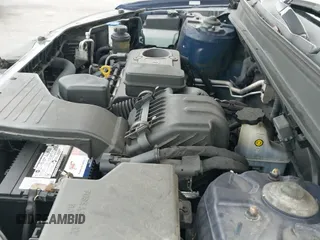 2010 Hyundai Santa Fe GLS z VIN 5NMSG3AB4AH388292, wystawiony jako IAAI lot #43460660 z przebiegiem 182 815 mil mil oraz . Historia ofert i sprzedaży dostępna na DreamBid. Obrazek 19.