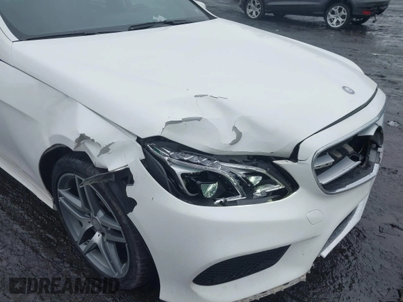 2016 Mercedes-Benz E 400 with VIN WDDHF6HB8GB179547, listed as a IAAI auction lot 41570461 with 147,765 mi miles and . Bid and sale history available at carsss.com. Image 6.