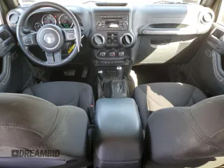 2016 Jeep Wrangler Unlimited Sport with VIN 1C4BJWDG4GL101387, listed as a Copart auction lot 49163905 with 96,956 mi miles and Salvage Title. Bid and sale history available at DreamBid. Image 8.