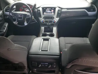 2015 GMC Yukon SLE with VIN 1GKS1AKC8FR733084, listed as a Copart auction lot 82960064 with 163,576 mi miles and Salvage Title. Bid and sale history available at carsss.com. Image 8.