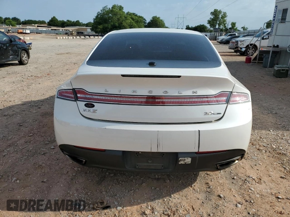 2014 Lincoln MKZ z VIN 3LN6L2G90ER820731, wystawiony jako Copart lot #57818185 z przebiegiem 133 133 mil mil oraz Szkoda całkowita • Salvage title. Historia ofert i sprzedaży dostępna na DreamBid. Obrazek 6.