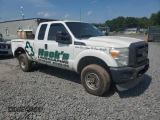 2013 Ford F-250 XL with VIN 1FT7X2B66DEA81666, listed as a Copart auction lot 65623755 with 330,532 mi miles and Salvage title. Bid and sale history available at DreamBid. Image 4.