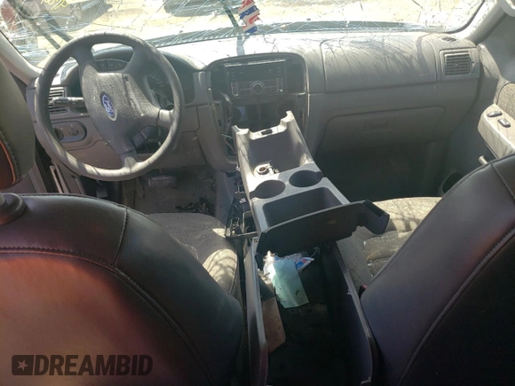 2004 Ford Explorer XLS z VIN 1FMZU72K44ZA66745, wystawiony jako Copart lot #55934795 z przebiegiem Nie podano mil oraz Szkoda całkowita • Salvage title. Historia ofert i sprzedaży dostępna na DreamBid. Obrazek 8.
