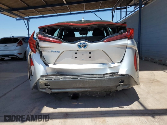 2021 Toyota Prius LE z VIN JTDKAMFP6M3183538, wystawiony jako Copart lot #54267425 z przebiegiem 29 374 mil mil oraz Szkoda całkowita • Salvage title. Historia ofert i sprzedaży dostępna na DreamBid. Obrazek 6.