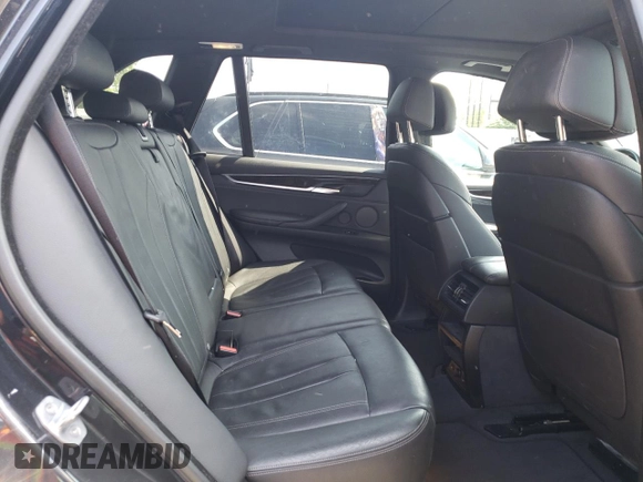 2017 BMW X5 xDrive35i with VIN 5UXKR0C37H0X80867, listed as a Copart auction lot 58697515 with 54,191 mi miles and Salvage title. Bid and sale history available at DreamBid. Image 11.