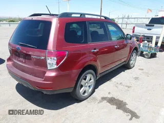 2009 Subaru Forester X with VIN JF2SH63649H726366, listed as a IAAI auction lot 42271256 with 209,342 mi miles and . Bid and sale history available at DreamBid. Image 4.