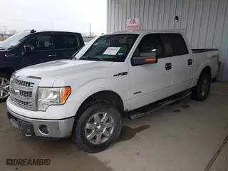 2013 Ford F-150 XL with VIN 1FTFW1ET6DKG24557, listed as a IAAI auction lot 41556261 with 216,065 mi miles. Bid and sale history available at carsss.com. Image 17.