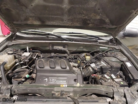 2002 Mazda Tribute LX with VIN 4F2YU08192KM65677, listed as a IAAI auction lot 41881715 with 131,837 mi miles. Bid and sale history available at carsss.com. Image 10.