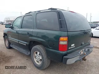 2002 Chevrolet Tahoe LT z VIN 1GNEC13ZX2R279380, wystawiony jako IAAI lot #42324646 z przebiegiem 188 781 mil mil oraz . Historia ofert i sprzedaży dostępna na DreamBid. Obrazek 3.